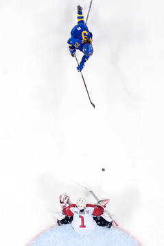 Rebecca Stenberg of Sweden shot the puck against goaltender