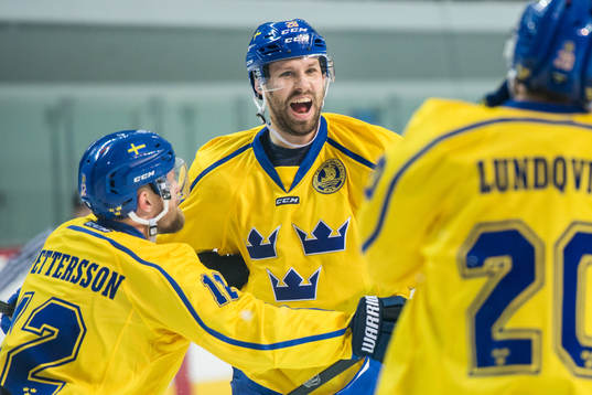 Dick Axelsson of Sweden celebrates with Fredrik Pettersson
