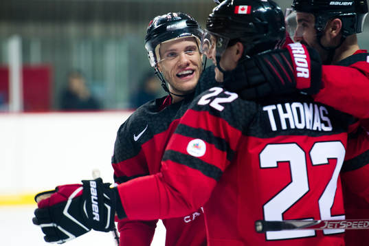 Christian Thomas of Canada celebrates with Mat Robinson