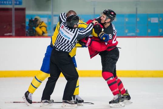 Patrik Hersley of Sweden in a fight with Rob Klinkhammer of