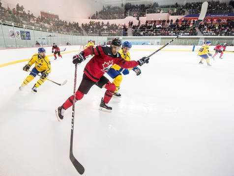 Rene Bourque of Canada against Simon Bertilsson and John