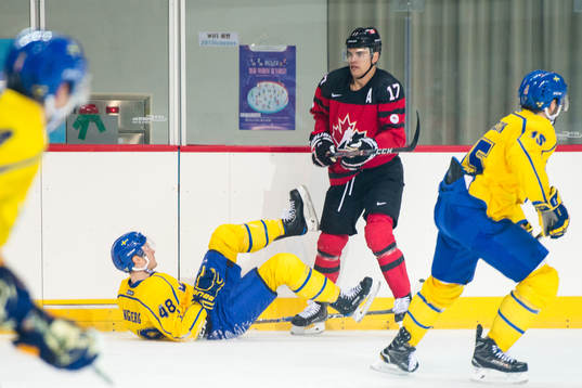 Carl Klingberg of Sweden and Rene Bourque of Canada