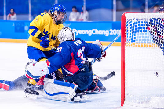 Erica Udén Johansson of Sweden scores the 4-0 goal behind