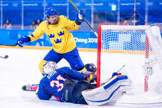 Erica Udén Johansson of Sweden scores the 4-0 goal behind