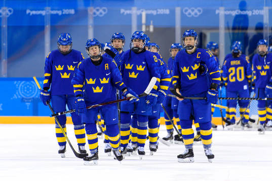The Swedish players looks dejected