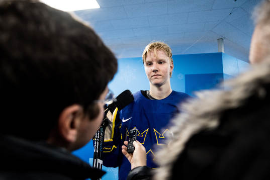Rasmus Dahlin of Sweden talks to media