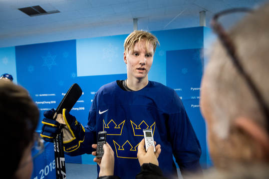Rasmus Dahlin of Sweden talks to media