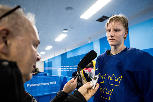 Rasmus Dahlin of Sweden talks to media