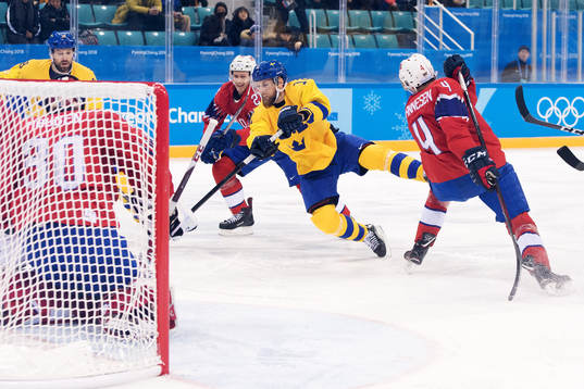 Fredrik Pettersson of Sweden shots against Goaltender Lars