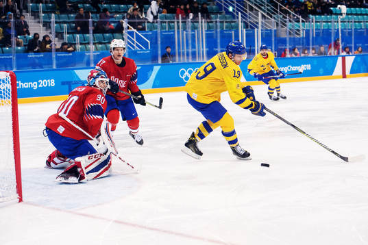 Patrik Zackrisson of Sweden in front of Goaltender Lars