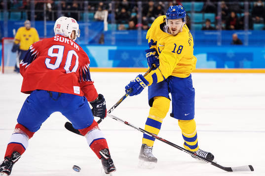 Dennis Everberg of Sweden shoots and Daniel Sørvik of