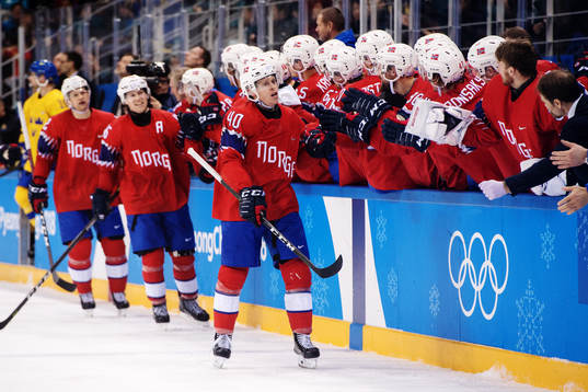 Johannes Johannesen of Norway celebrate with team mates