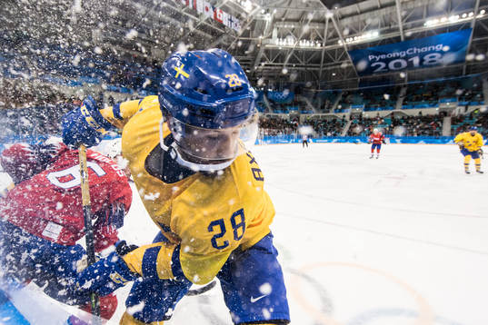 Dick Axelsson of Sweden in the Men's Ice Hockey Preliminary