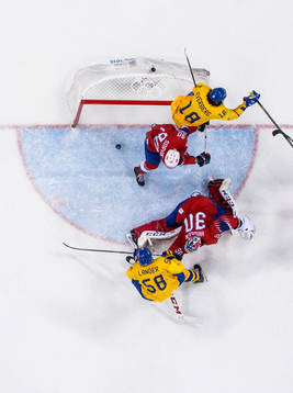 Anton Lander of Sweden scores 0-2 behind Goaltender Lars