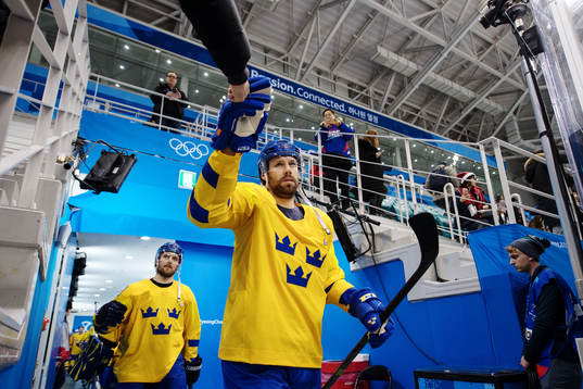 Dick Axelsson of Sweden enters the ice prior to the Men's
