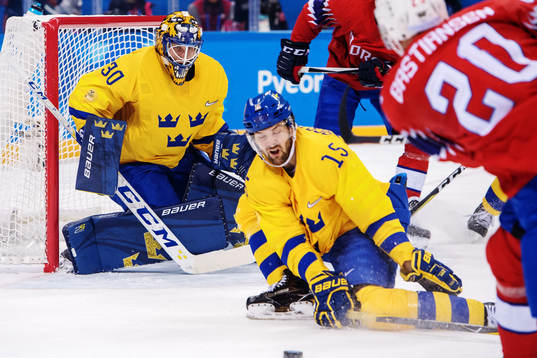 Goaltender Viktor Fasth of Sweden and Simon Bertilsson of