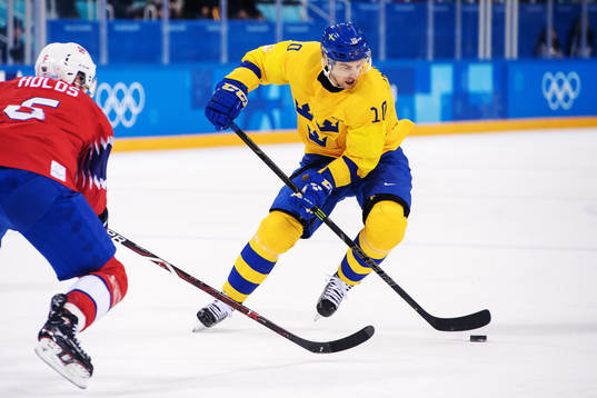 Joakim Lindström of Sweden with the puck in the Men's Ice