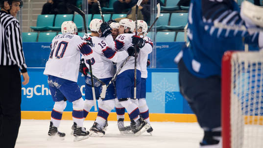 Team of Norway celebrates a goal in the ice hockey game