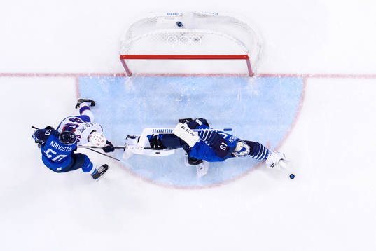 Goaltender Mikko Koskinen of Finland throws himself