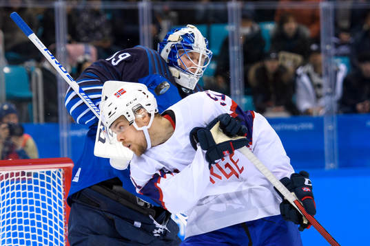 Goaltender Mikko Koskinen of Finland and Mats Rosseli Olsen