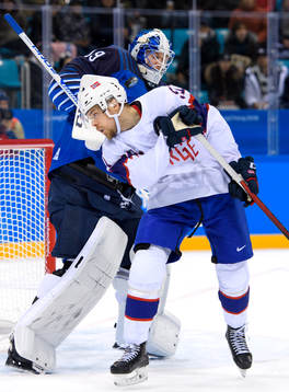 Goaltender Mikko Koskinen of Finland and Mats Rosseli Olsen