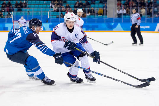 Mika Pyorala of Finland and Mathis Olimb of Norway in the