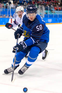 Miika Koivisto of Finland in the ice hockey game between