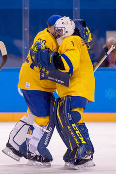 Goaltender Viktor Fasth of Sweden and Goaltender Jhonas