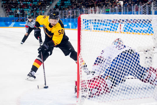 Patrick Hager of Germany scores in the penalty shoot-out in