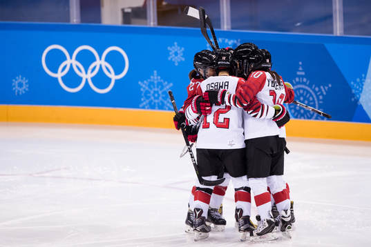 Team japan celebrating the 0-1 goal in the Women's Ice