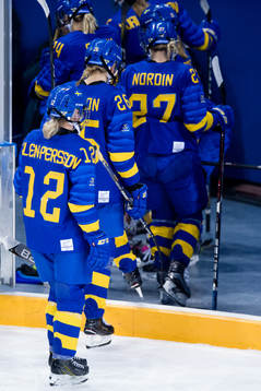 Team Sweden looks dejected when leaving the ice