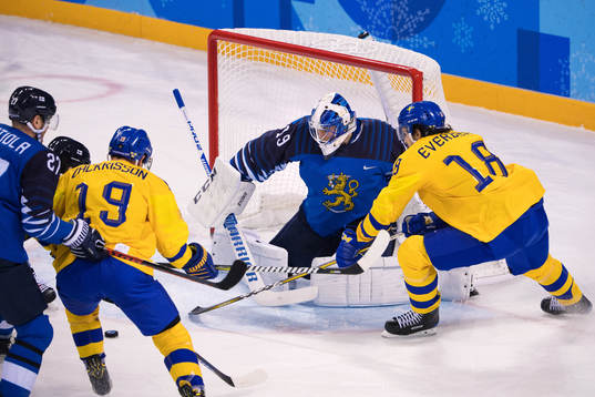 Patrik Zackrisson and Dennis Everberg of Sweden challenges