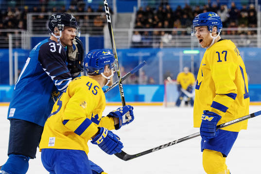 Oscar Möller and Pär Lindholm (goal scorer) of Sweden