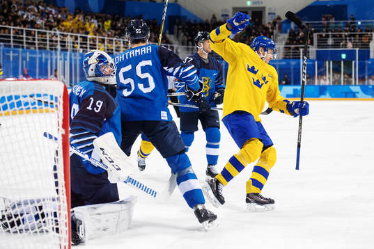 Goaltender Mikko Koskinen of Finland looks dejected while