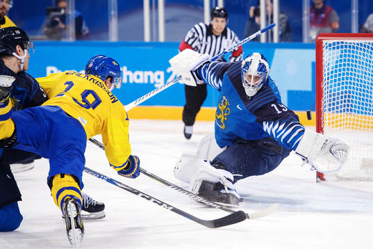 Patrik Zackrisson of Sweden scores 2-1 behind Goaltender