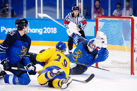 Patrik Zackrisson of Sweden scores 2-1 behind Goaltender