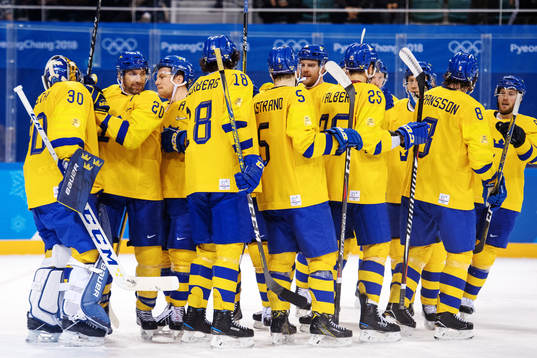 Joel Lundqvist and team mates of Sweden celebrating