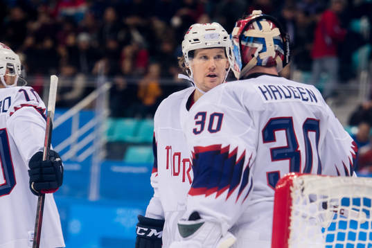 Aleksander Bonsaksen and Goaltender Lars Haugen of Norway