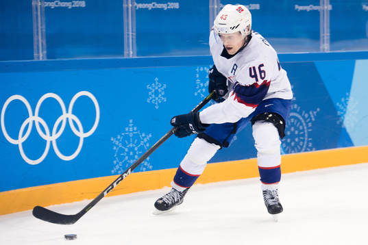 Mathis Olimb of Norwa in the Men's Ice Hockey Playoff match