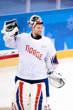 Goaltender Lars Haugen and Jonas Holøs of Norway in the