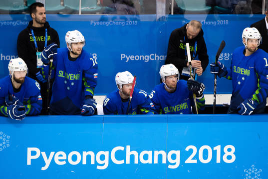 Team Slovenia looks dejected in the Men's Ice Hockey