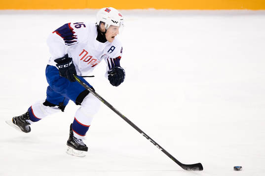 Mathis Olimb of Norwa in the Men's Ice Hockey Playoff match