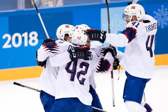 Aleksander Bonsaksen of Norway celebrates with his teammates