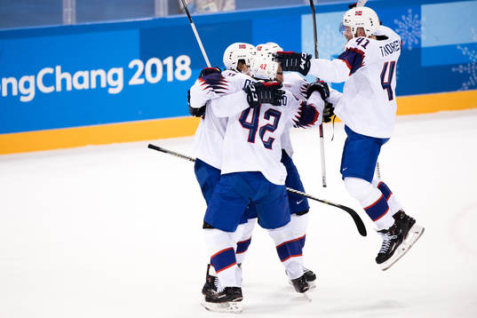 Aleksander Bonsaksen of Norway celebrates with his teammates