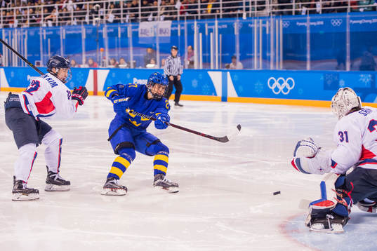 Kim Heenwon of Korea, Emma Nordin of Sweden and goaltender