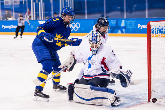 Olivia Carlsson of Sweden in action with goaltender Shin So
