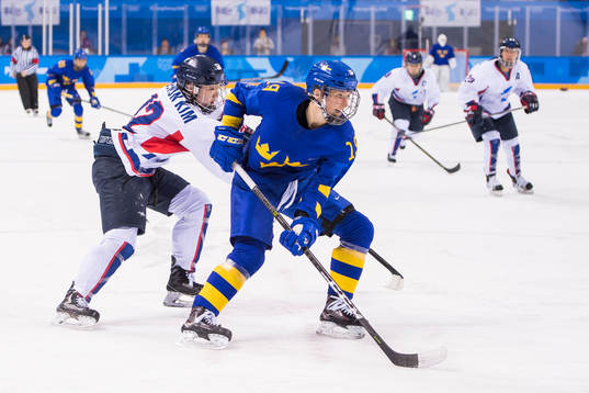 Kim Heenwon of Korea and Maria Lindh of Sweden in the