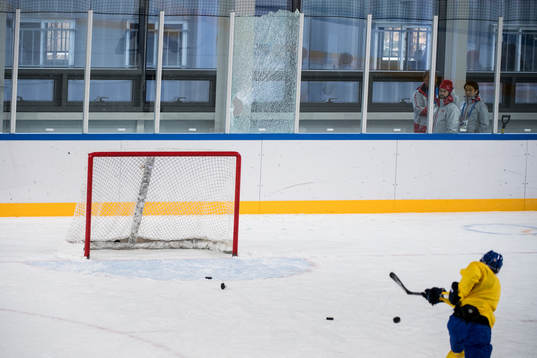 Fredrik Pettersson of Sweden breaks the glas behind the goal