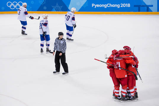 Team Russia (OAR) celebrates the 3-0 goal while Team Norway