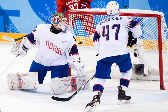Goaltender Henrik Haukeland of Norway looks dejected